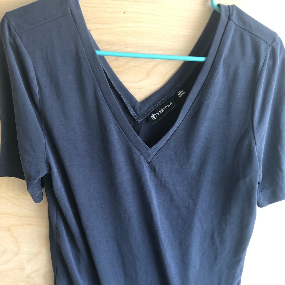 Navy Shirt and mint colored pants.